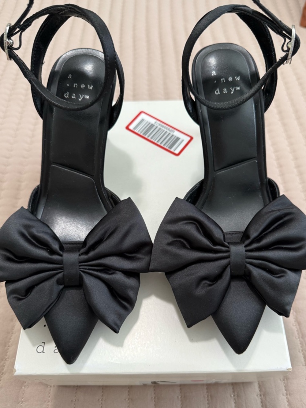 A New Day black satin bow heels